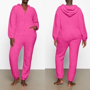 Skims Cozy Hooded Plush Onsie in Hot Pink
